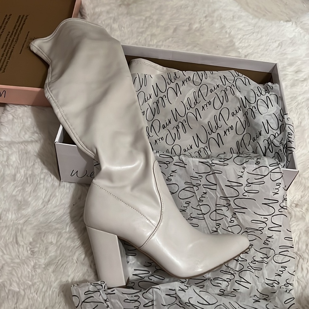 New high boots over knee. Off white color size 8.5